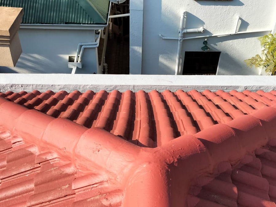 Ridge repairs beside a concrete box gutter